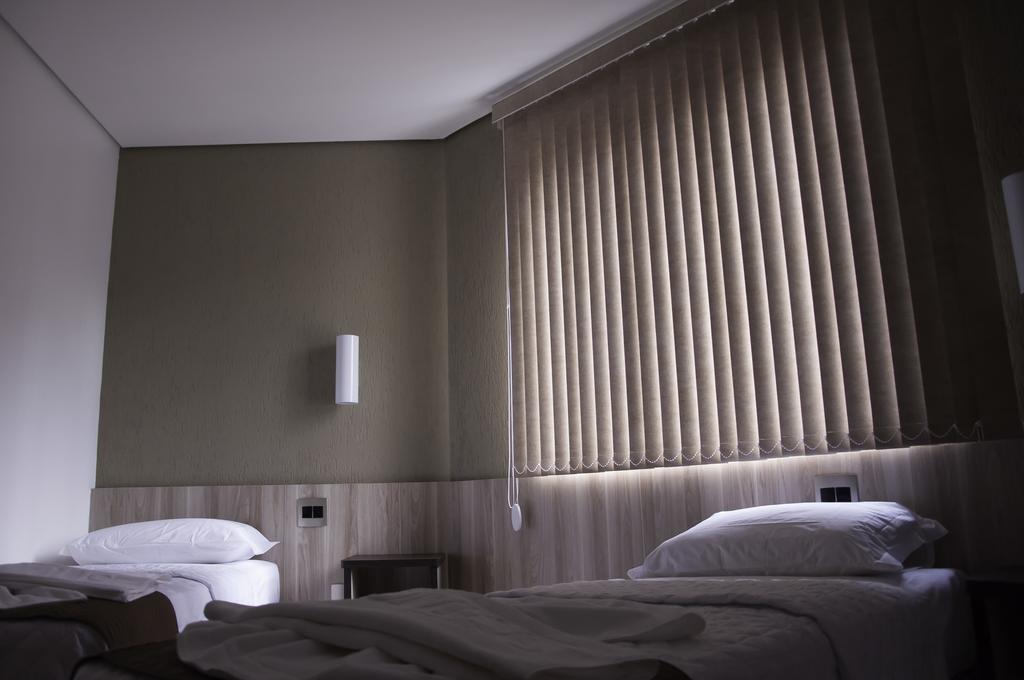 Hotel Domus Итабира Екстериор снимка